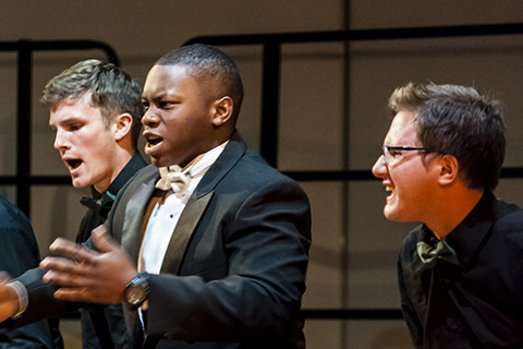 Vocal group performs on stage